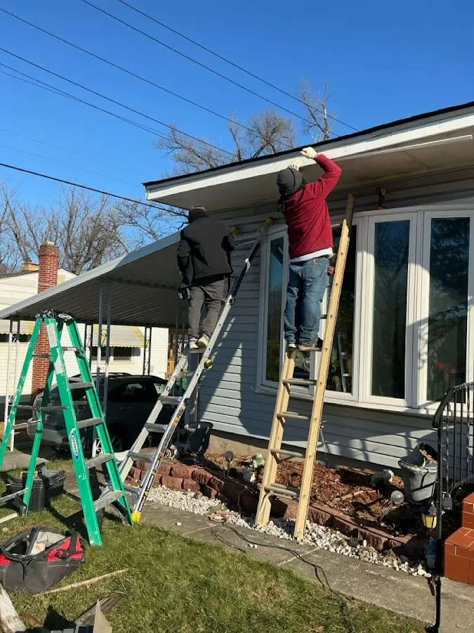 Restoration crew performing exterior repair in Sumner